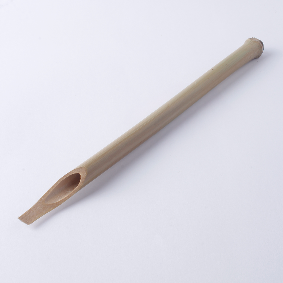 Beige wooden tool on a white background